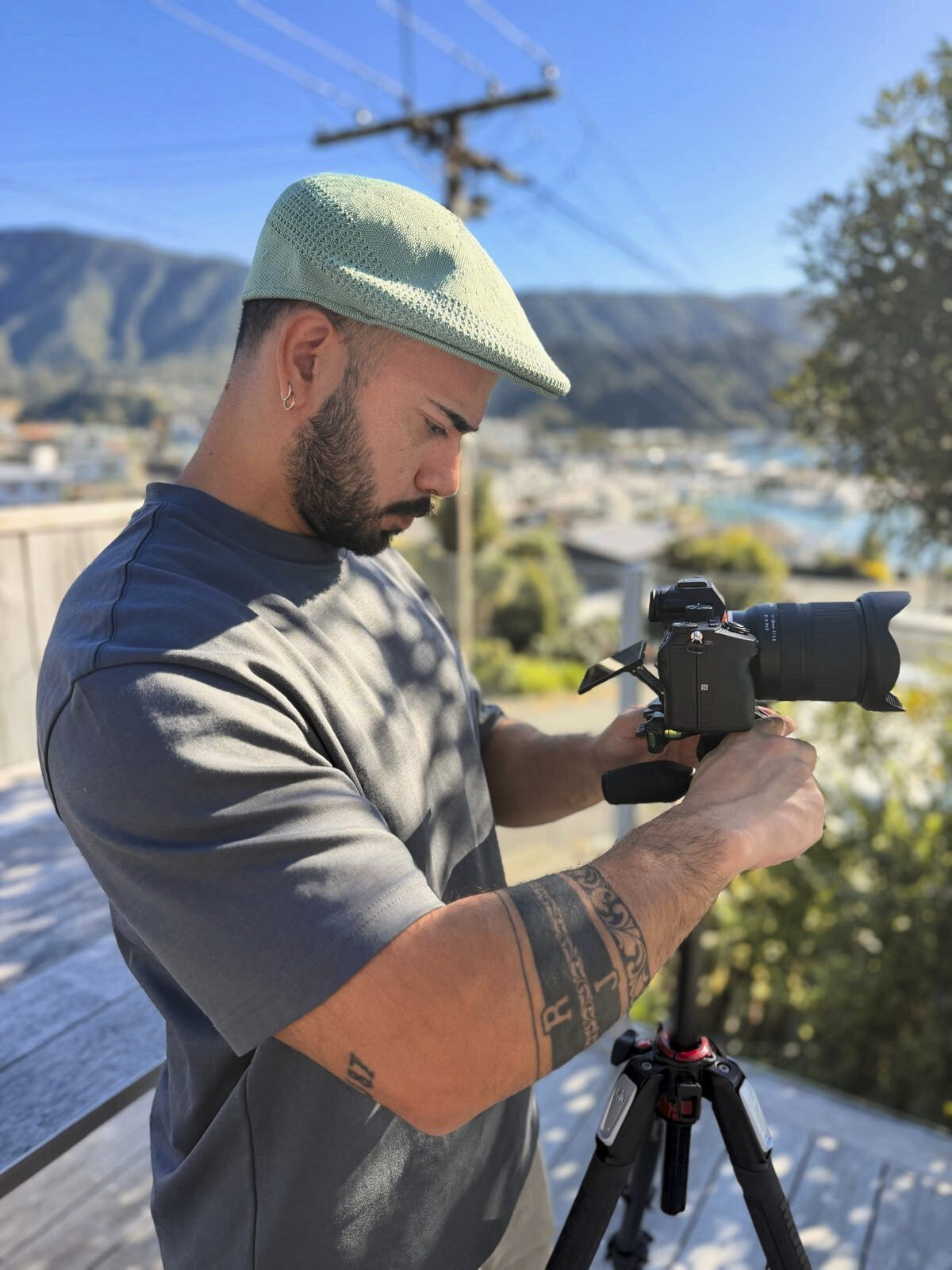 Hugo Roa composing a shot on location, Picton