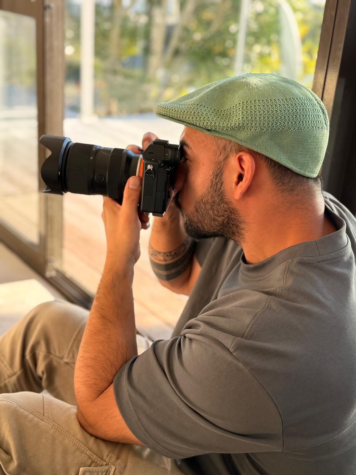 Hugo Roa framing an interior shot through a window